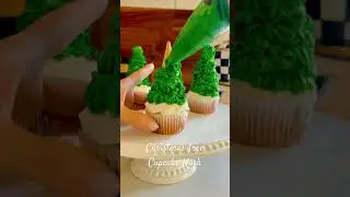 Christmas Tree Cupcake Hack! All you need is a cupcake, ice cream cone, and green frosting! #holiday