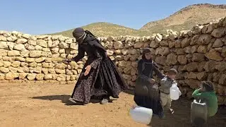 Daily life of Iranian nomads: cleaning sheep pens