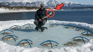 Ice Fishing in Completely Frozen River - Giant Trout Caught in Extreme Cold