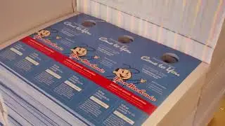 See Video of Door Hangers getting Die Cut