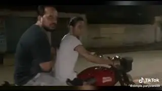 Tiktok Indian Girl riding bike in shorts in India