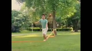 guy green shirt white shorts slackline fail