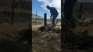 turning compost pile