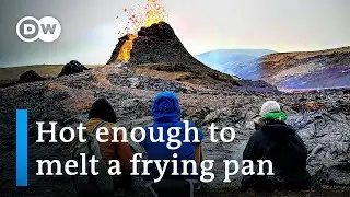 Tourists flock to Iceland volcano, cook food on lava | DW News