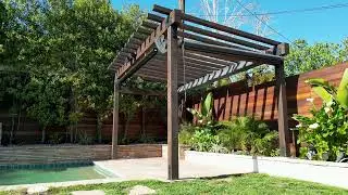 Transforming Backyards: Dual Pergola Design with Custom Outdoor Screens and Entertainment Area