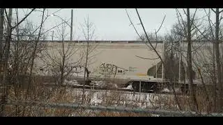 CN L551 EMD GP38-2 4910 & GP9RM 4125 are Switching some Hoppers in Glasslead Industrial Spur 