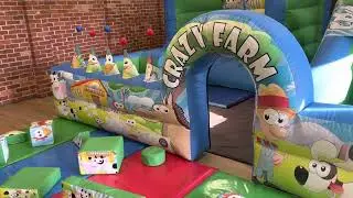 Crazy Farm themed inflatable play park, with 17 piece crazy farm themed soft-play set and Didicars