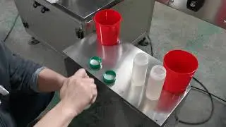 Automatic cap foil liner induction sealer