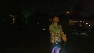 Digital Dwight spinning the poi sticks
