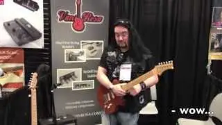 Tommy Bolan (Richie Ramone Band) tests out the Stay Tuned Tremolo Claw at Summer NAMM 2013