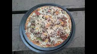 Making A Griddle Supreme Pizza While Camping 