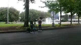 A SEGMENT OF SEATTLE REFINED BEING FILMED NEAR THE INTERNATIONAL FOUNTAIN