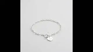 Mum Charm Bracelet Created with Zircondia&reg; Crystals by Philip Jones Jewellery
