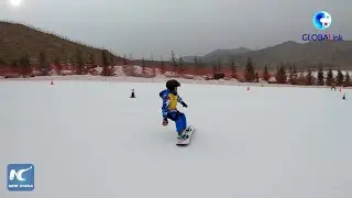 GLOBALink | Children enjoy winter vacation at ski resort in NW China's Gansu