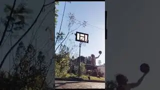 60 year old left handed over the shoulder reverse layup trick shot.