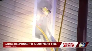 Firefighters rush to scene of apartment fire in Walnut Hills