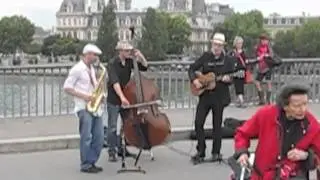 Music on Pont Saint Louis, Paris, swing in paris, billy collins