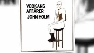John Holm - Vid ett f&ouml;nsterbord mot parken