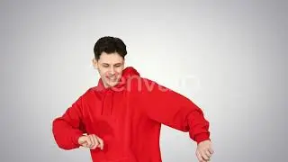 Successful Young Casual Man Receiving Good News on the Phone and Dancing After This on Gradient ...
