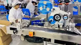 High speed small carton case paging feeding top side labeling machine