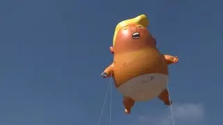 'Trump Baby' balloon takes flight at protest in London