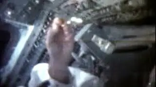 Neil Armstrong demonstrates the unusual behavior of water in microgravity