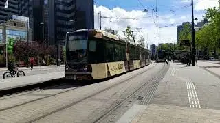 Drie RET Trams Coolsingel waarvan twee trams met reclame.