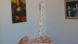 Aprenda a fazer uma guitarra de arame alumínio...Learn how to make an aluminum wire guitar ...