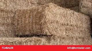 Farming usa mowing hay and baling it