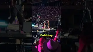 Coldplay fan FALLS off stage during the show!