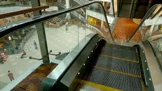 Chinatown Point mall moving stairways