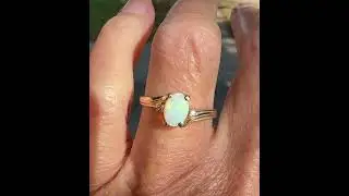 Charming Diamond Accent Opal Solitaire Ring in Gold