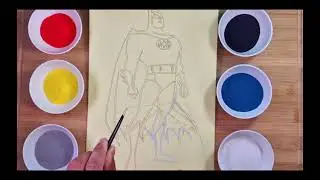 Colouring drawing paintaing BATMAN with sand.Disney Cartoon.एक झूले पर रेत पेंटिंग बच्चे को रंगना।.
