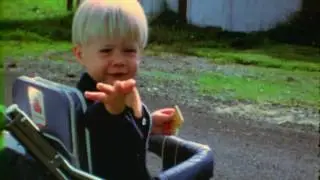 Baby Kurt Cobain kissing the camera and playing guitar - Montage of Heck clip