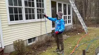 Exterior house washing and pressure washing house in Georgetown, MA.