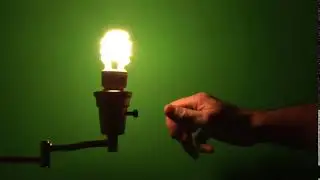 Energy Saving Florescent Light Bulb Against Green Screen - Chroma Key - No Copyright