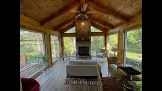 3 Season Porch Addition with Chainsaw Milled Rafters, Hearth, and Mantel. Larson Scenic Windows