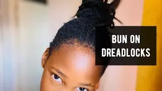 sleek bun on short dreadlocks🌈