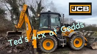 Jcb 4cx backhoe moving and loading muck