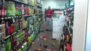 Woman crashes car into Green's liquor store, midtown Atlanta TWICE! Aftermath