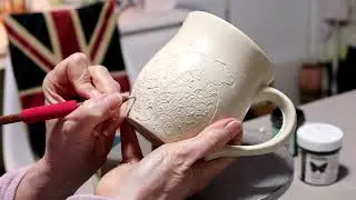 Experimenting wtih Mishima- Pottery designs with wax resist