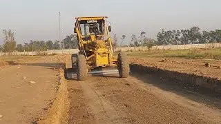 grader operater achive the sub base terget point and moter roller compact road || water tank working