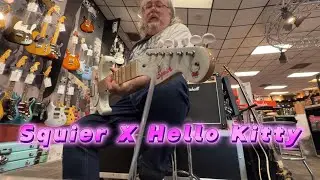 Hello Kitty Squier Stratocaster demo at Guitar Center.