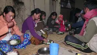 Cutting and cooking village meat and eating together with family