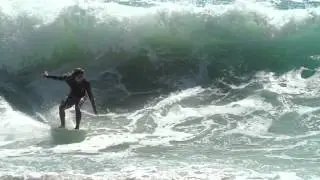 Skimboarding a sider in Laguna Beach