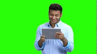Cheerful Indian Man With Tablet Pc On Green Screen - Chroma Key - No Copyright
