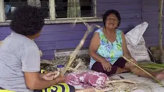 Making tapa cloth and Fiji Fans in Vusaratu Village