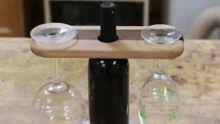 Wine bottle glass holder