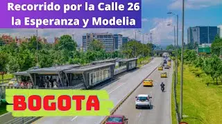 Calle 26,  Av. la Esperanza, Modelia, en Automóvil