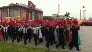 'Chairman Kim' presides over mass parade
